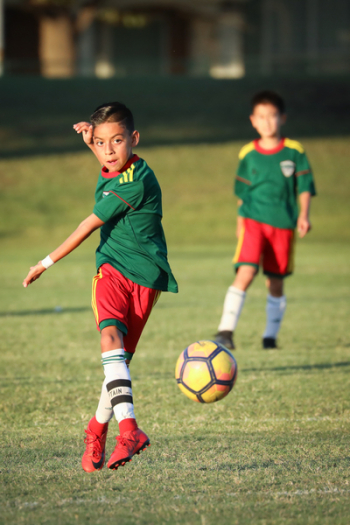 Boy Playing Soccer Boy Playing Soccer
