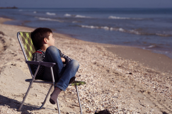 Boy Sitting on Chair