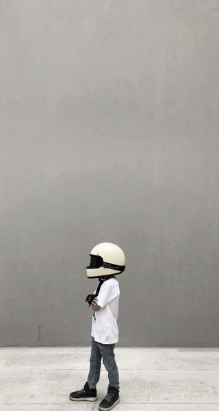 boy wearing full-face helmet boy wearing full-face helmet