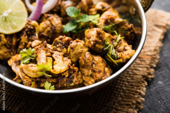 Brain / Bheja Fry of goat, sheep or lamb is a popular Indian or pakistani dish cooked on Bakra Eid(Eid-ul-zuha). served in karahi, pan or plate. selective focus