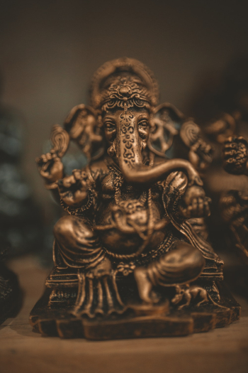 Brass-colored Lord Ganesha Figurine Brass-colored Lord Ganesha Figurine