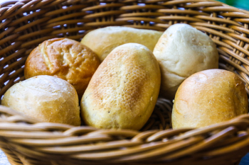 Bread In Brown Wicker Basket Bread In Brown Wicker Basket
