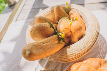 Bread rolls in a woven basket Bread rolls in a woven basket
