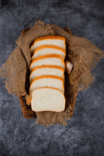 Bread slices on a burlap . Free Photo Bread slices on a burlap . Free Photo