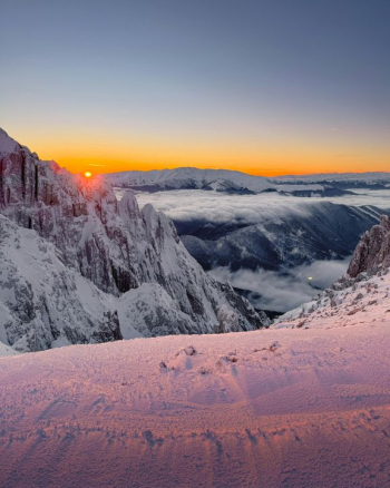 Breathtaking Winter Sunrise Over Snow-Capped Mountains Breathtaking Winter Sunrise Over Snow-Capped Mountains