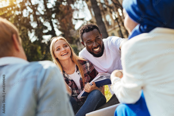 Bright optimistic people enjoying active conversation