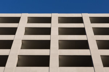 Bright Parking Structure Under Clear Blue Sky