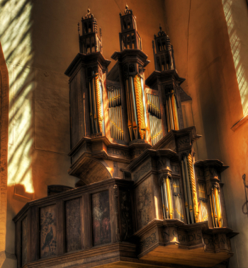 Brown and Beige Pipe Organ in Corner Brown and Beige Pipe Organ in Corner