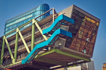 Brown Blue and Green Building With Blue Staircase Brown Blue and Green Building With Blue Staircase