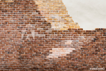 Brown brick wall textured background Brown brick wall textured background