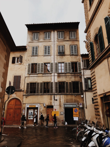 Brown Building Under gray sky Brown Building Under gray sky