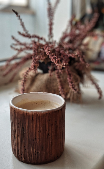 Brown Ceramic Mug With Brown Liquid Inside Brown Ceramic Mug With Brown Liquid Inside