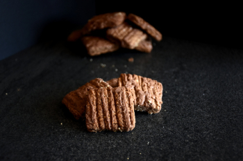 Brown Crackers On Black Cloth Brown Crackers On Black Cloth