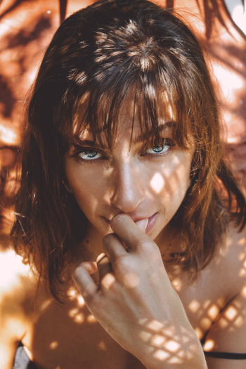 Brown-haired Woman Holding Lips Brown-haired Woman Holding Lips