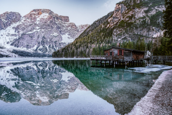 Brown Lakeside Cottage Beside Rocky Mountain Brown Lakeside Cottage Beside Rocky Mountain