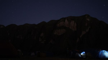 brown mountain at nighttime brown mountain at nighttime
