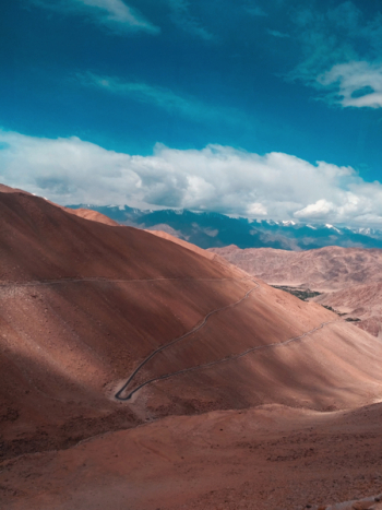 Brown Mountain Under Blue Sky
