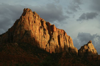 brown mountain under gray sky brown mountain under gray sky