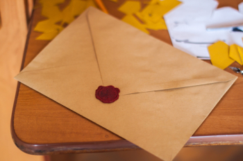 Brown Paper Envelope on Table Brown Paper Envelope on Table