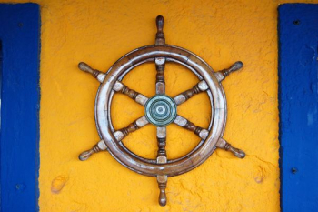 brown ship helm on wall brown ship helm on wall