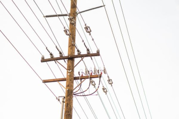 brown transmission tower with cables brown transmission tower with cables
