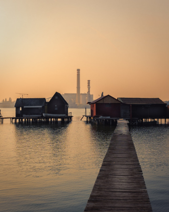Brown Wooden House and Dock Brown Wooden House and Dock