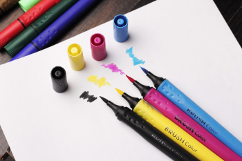 Brush Colouring Pens On Top Of White Paper Brush Colouring Pens On Top Of White Paper