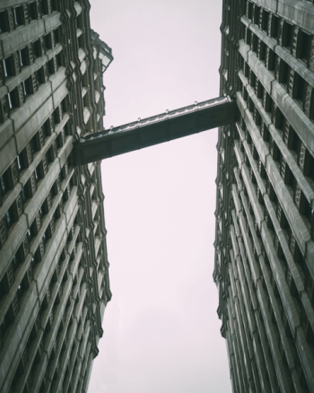 Building Bridge Under Gray Sky Building Bridge Under Gray Sky