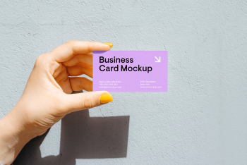 Business Card in Women Hand Mockup Business Card in Women Hand Mockup