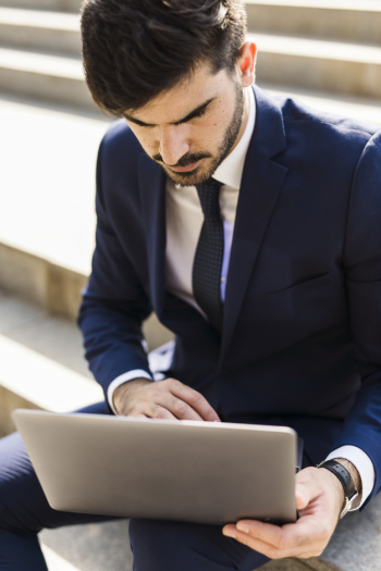 Business man using his laptop