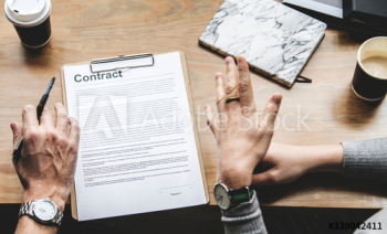 Business people discussing a contract Business people discussing a contract