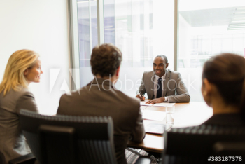 Business people in conference room meeting Business people in conference room meeting