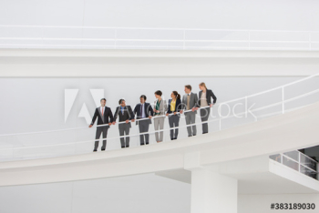 Business people on modern balcony Business people on modern balcony