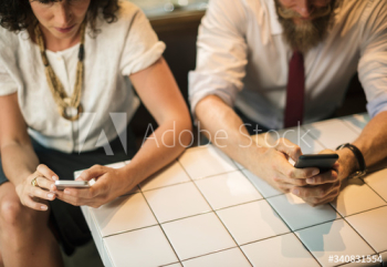 Business People using the phone at coffee shop Business People using the phone at coffee shop