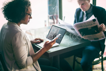 Business people working in a cafe Business people working in a cafe
