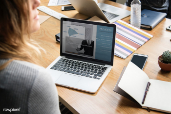 Business people working on a laptop | Free stock psd mockup - 414346