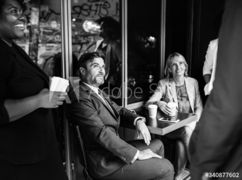 Business team meeting at a cafe Business team meeting at a cafe