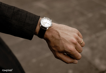 Businessman checking the time on his watch | Free stock photo - 526787 Businessman checking the time on his watch | Free stock photo - 526787