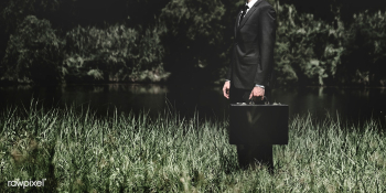 Businessman standing on a grass outdoors | Free stock photo - 48879 Businessman standing on a grass outdoors | Free stock photo - 48879