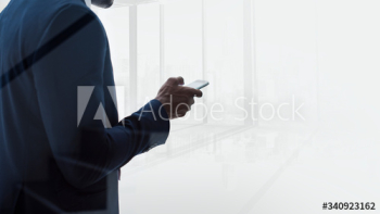 Businessman texting Businessman texting