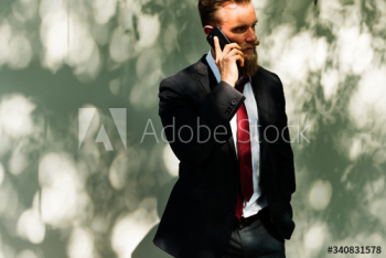 Businessman using mobile phone communication technology Businessman using mobile phone communication technology