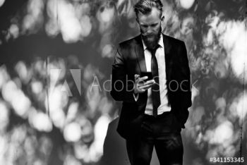 Businessman using mobile phone communication technology Businessman using mobile phone communication technology