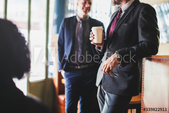 Businessmen having a coffee break Businessmen having a coffee break