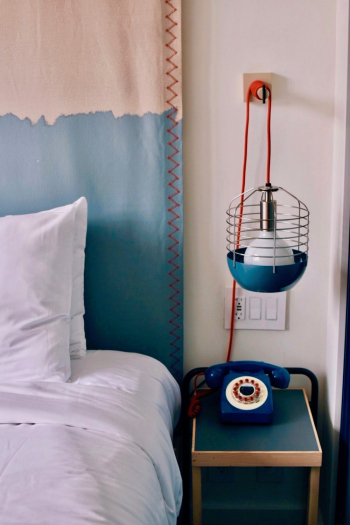 Caged Lamp Beside Bed