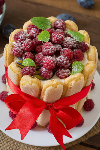 Cake "charlotte " with raspberries and plums. Free Photo Cake "charlotte " with raspberries and plums. Free Photo