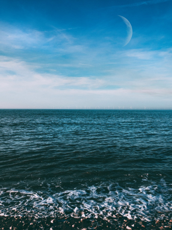 Calm Body of Water Under Blue Sky Calm Body of Water Under Blue Sky