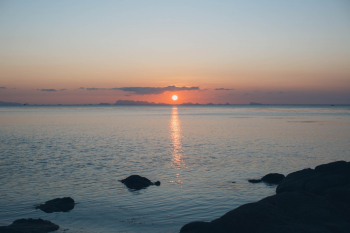 Calm Ocean Water during Golden Hour Calm Ocean Water during Golden Hour
