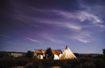 camping tent on field during nighttime camping tent on field during nighttime