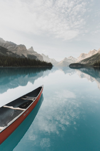 Canoe on Lake in Mountains Canoe on Lake in Mountains