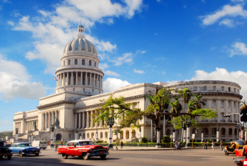Capitolio building Havana, Cuba with vintage old american cars